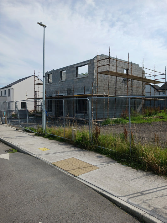 "Houses Being Built In Ireland". Photograph by Damien Leech