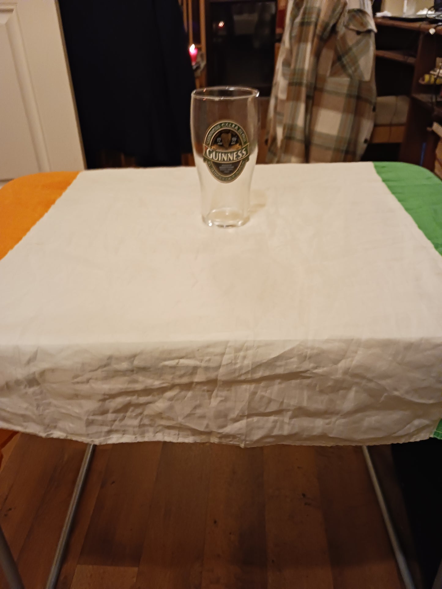 Photograph of Guinness Pint Glass and Irish Flag by Damien Leech